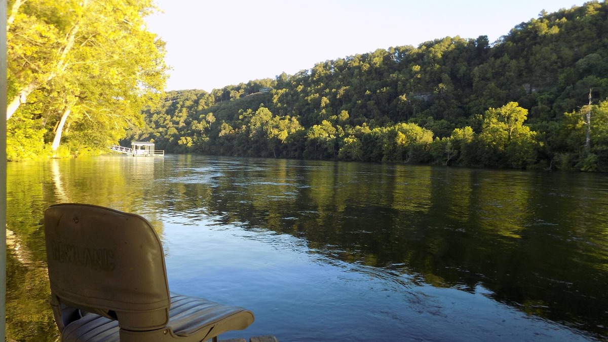 Bull Shoals Cottage | Newlands Peaceful Escape on the White River close to the bank and boat dock.