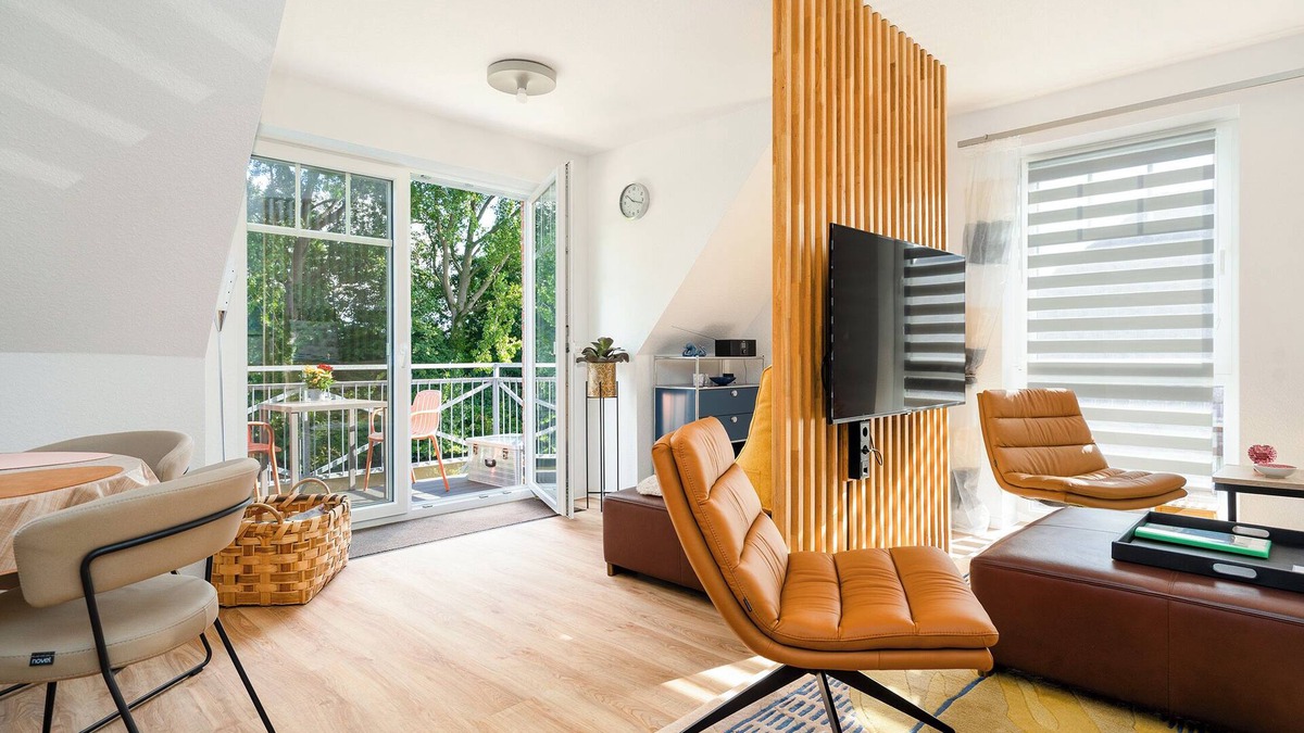 Eilsum Apartment | Newly built apartment (80sqm) with balcony directly on the water near Greetsiel!