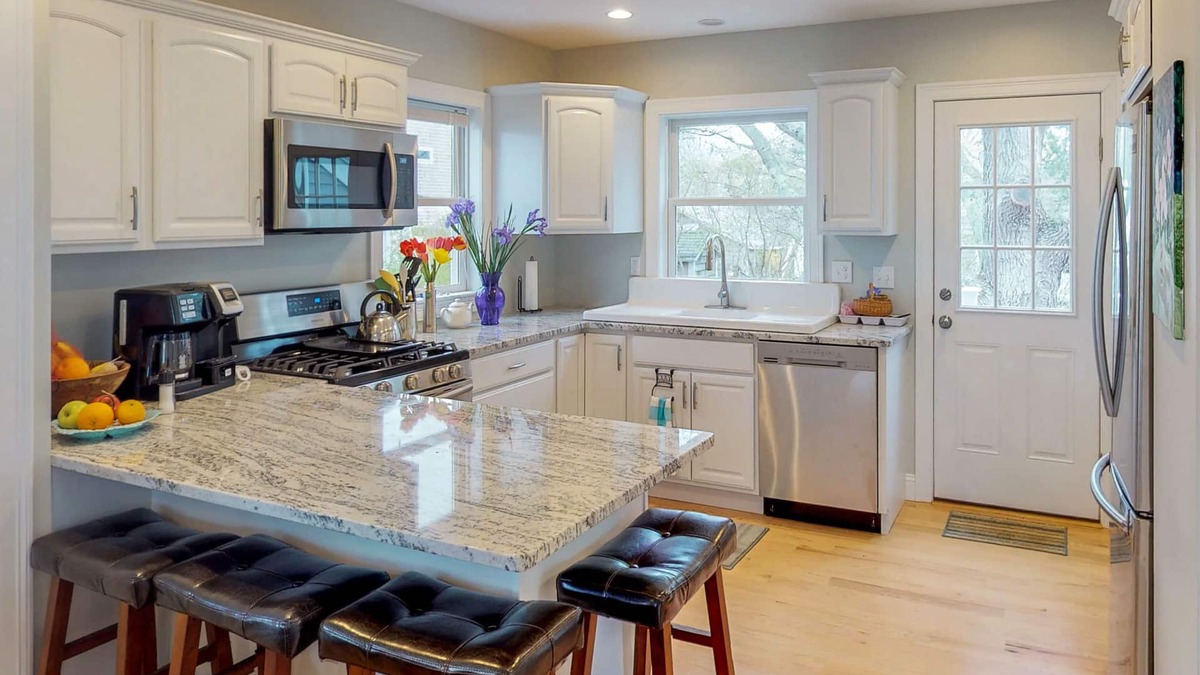 Teaticket House | Newly built bayview home, steps to dock/launch on Great Pond - small dogs OK