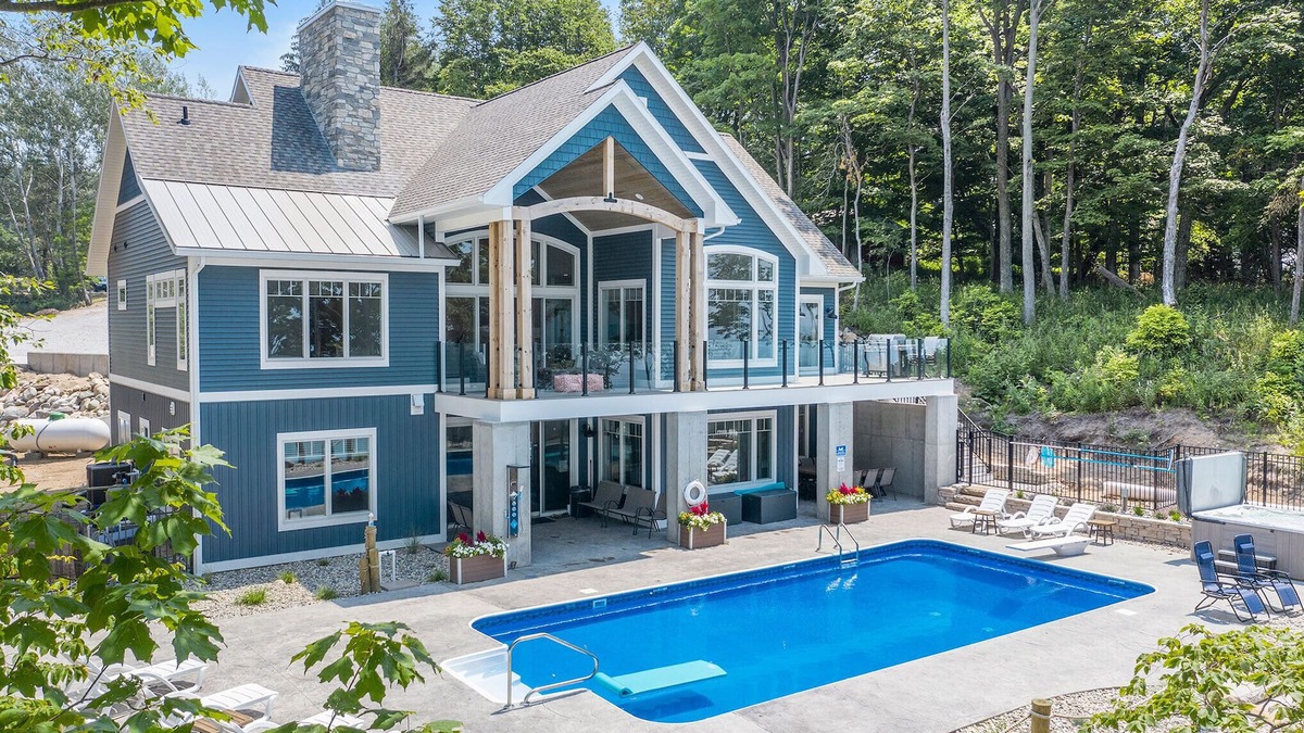 Ludington House | newly built house, beachfront, heated saltwater pool always 85°!
