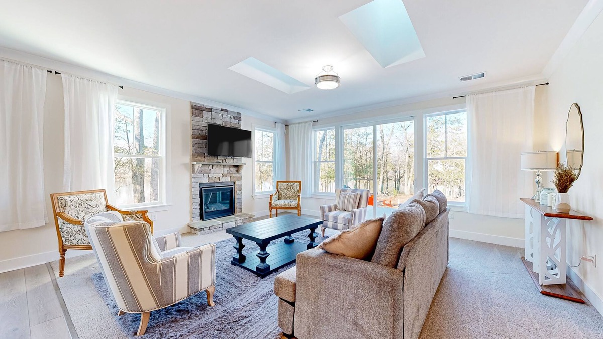 Seaford House | Newly built riverfront home with dock, kayaks, basketball court, & game room