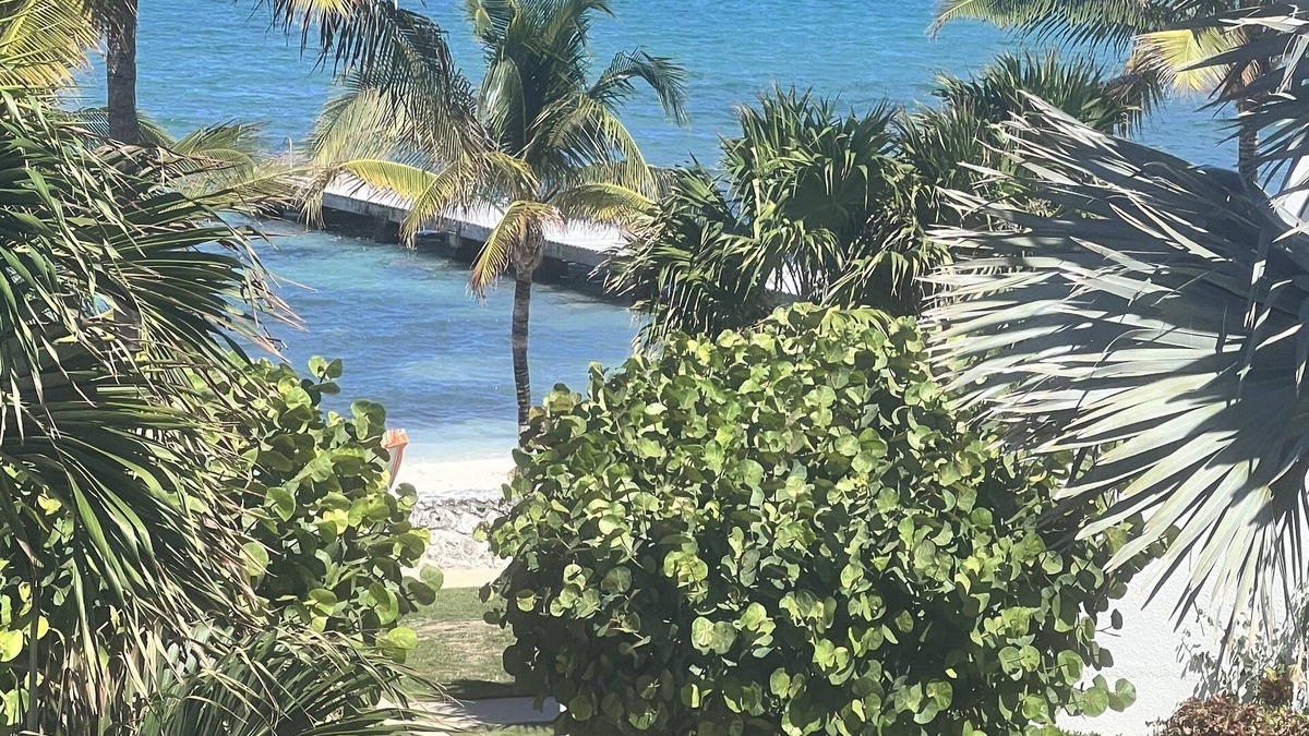 West Bay Villa | NEWLY RENOVATED! beach/ocean views, 2 BR, 2BA, quiet, gorgeous beach.