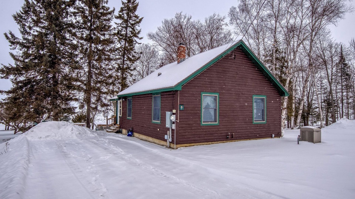 Rangeley Plantation Cabin | Niboban Cabin 5 right on Rangeley Lake with a screened porch, fire pit, hammock, WiFi and dock!