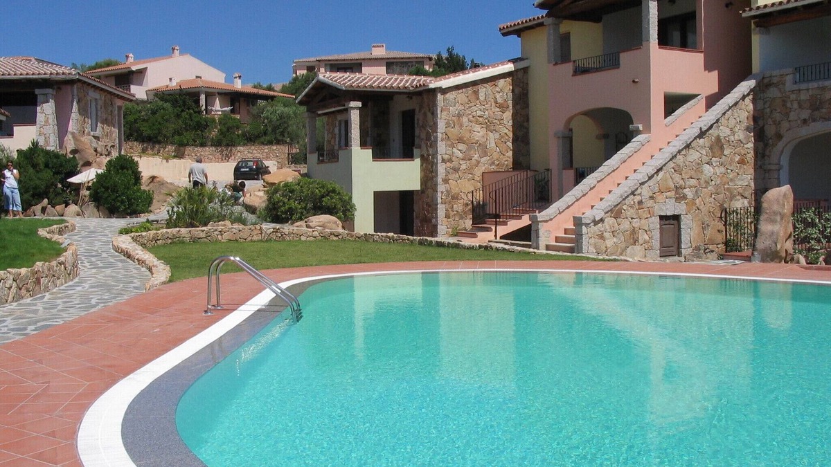 Monte Petrosu Apartment | Nice apartment with roof terrace in an elegant complex with swimming pool