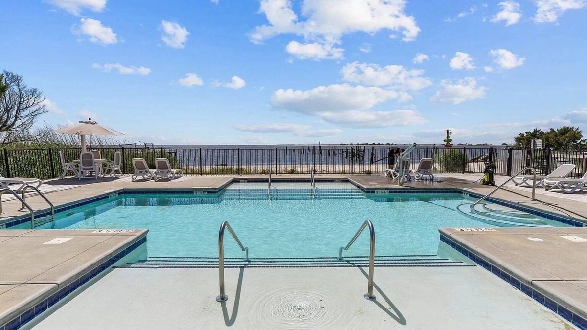 Southport Condo | No Cleaning Fee! Brand New Double Queen Studio Condo w/Waterfront Pool + Beach