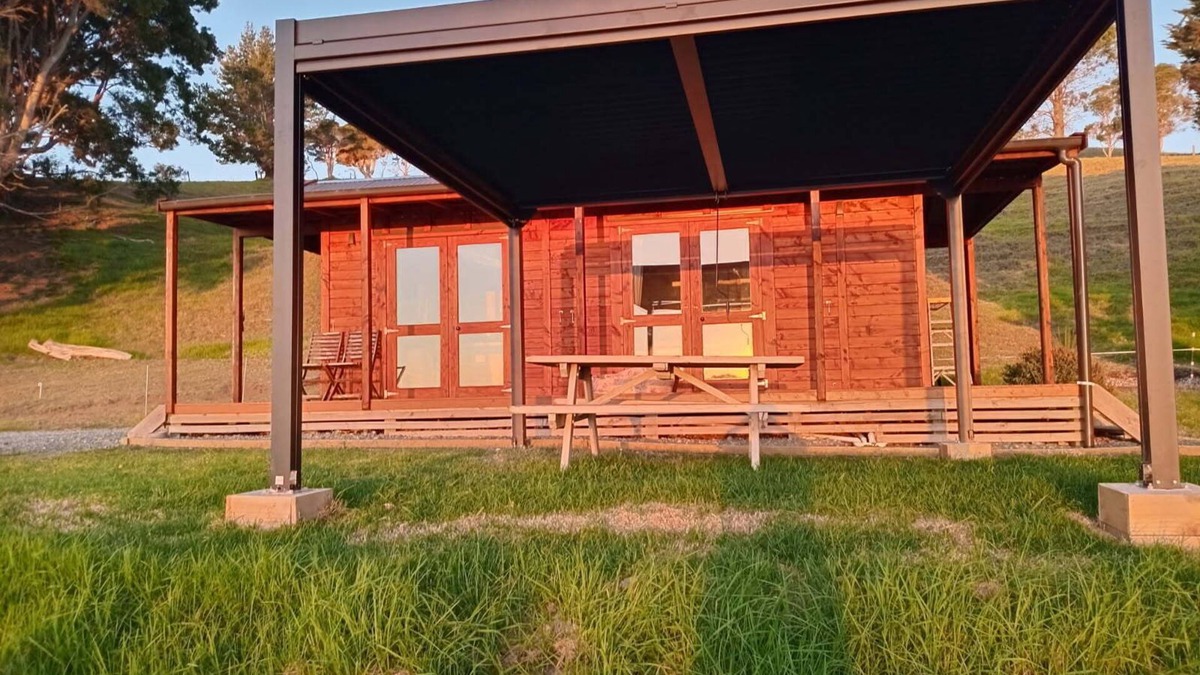 Mangonui Cabin | No other quite like it! Waterfront private cabin stay.