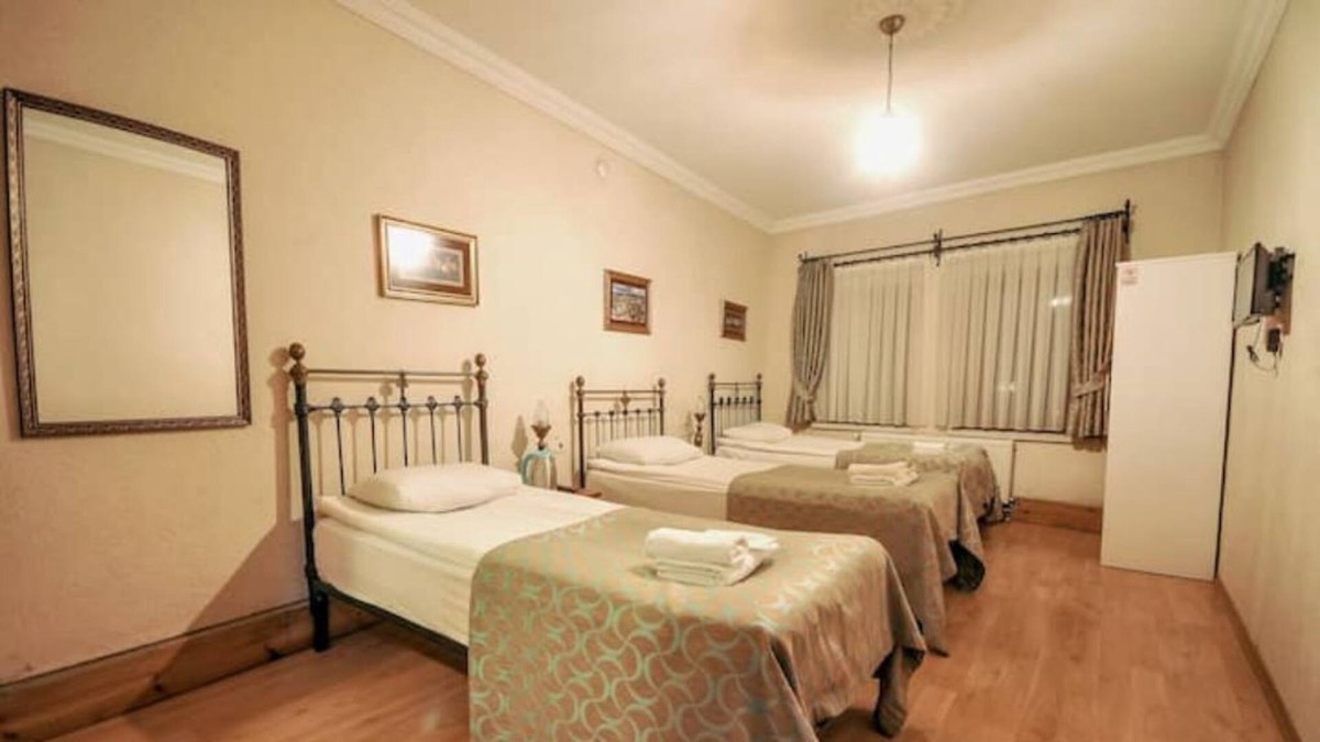 Goreme House | Nomads - Triple Room at the heart of Cappadocia