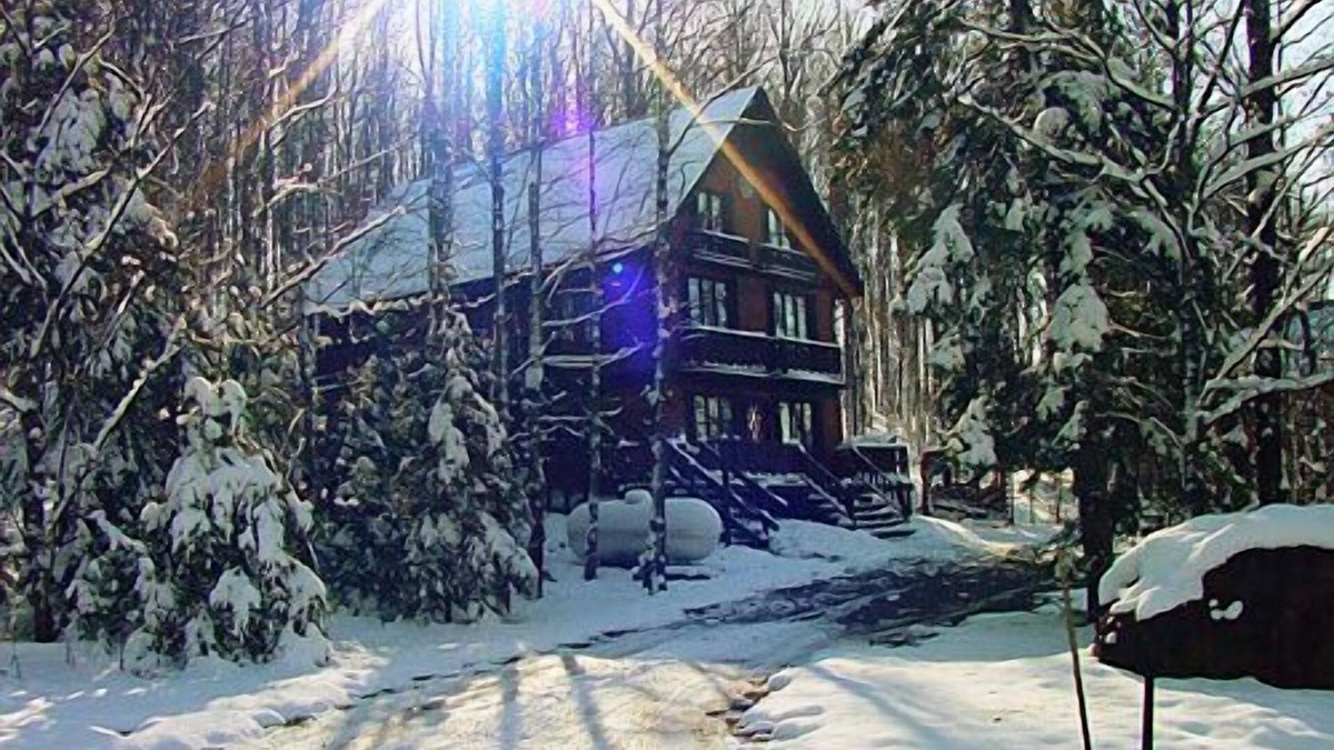 Stambaugh Ski Chalet | Nordic Haus chalet nestled in the serene woods of Ski Brule Village