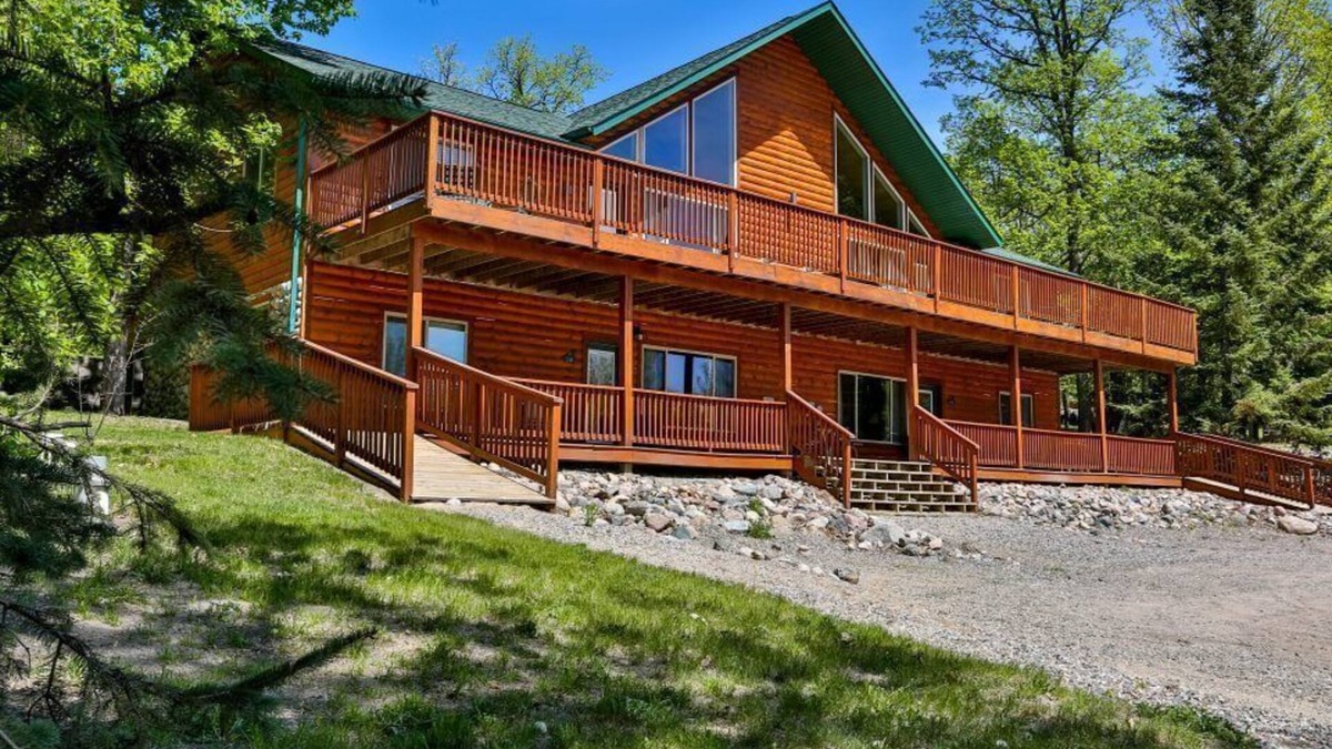 Puposky Villa | Northwoods Cabin Retreat - Steps to Resort Pool & Activities