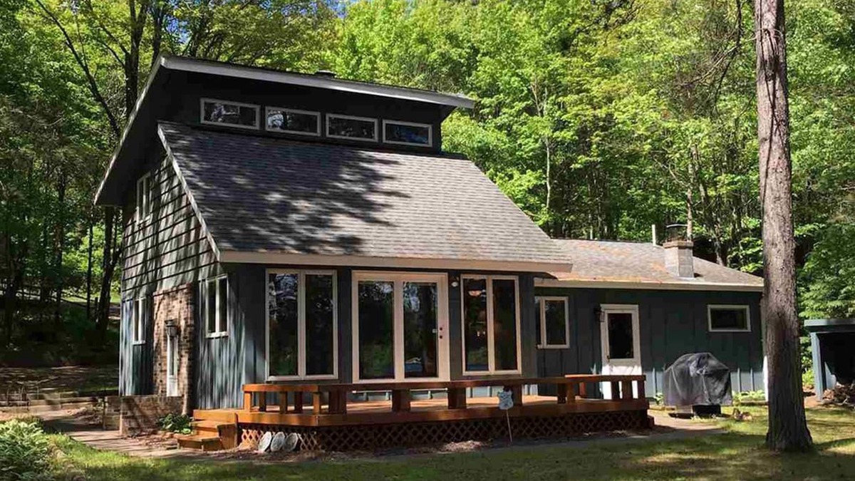 Solon Springs Cabin | Northwoods lake home with gentle slope to clear lake with sandy beach