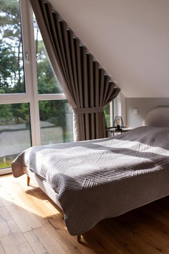 Stepnica Apartment | Nowoczesne apartamenty przy plaży nad Zalewem Szczecińskim w Czarnocinie