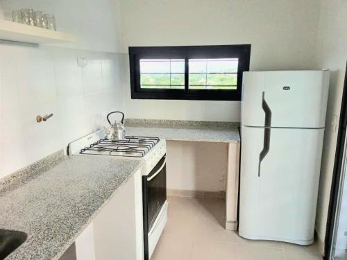 Comuna Estancia Vieja House | Nuestras raíces
