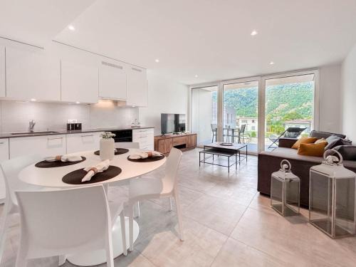 Melano Apartment | Nuovo e moderno appartamento 2 locali vicino al lago