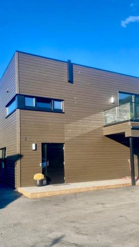 Tromsdalen Apartment | Nydelig hjem nært alt i Tromsø rett med Fjellheisen gratis parkering rett med huset