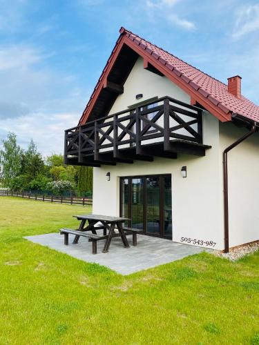 Mikolajki House | O Wilku Mowa!- domki całoroczne