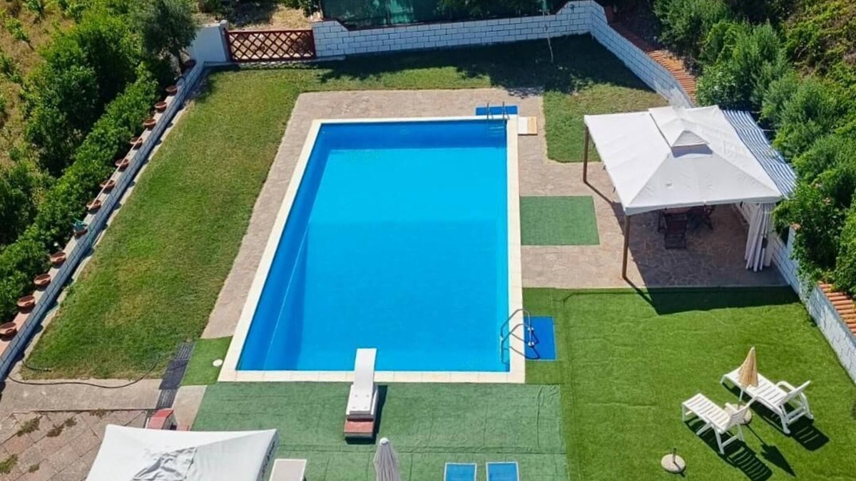 Nulvi Apartment | Oasis of Relaxation: Apartment with Private Pool Surrounded by Nature