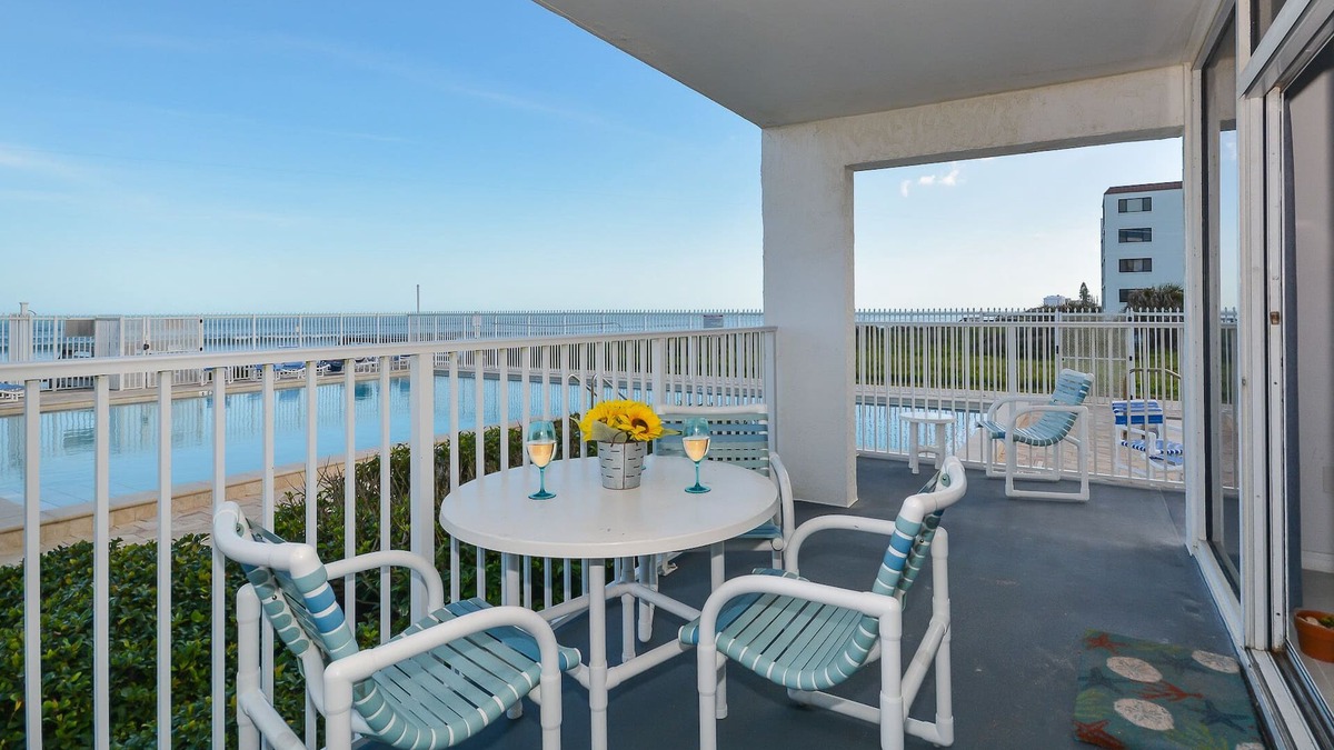 Bethune Beach Condo | Ocean Condo 104 ~ Ground Floor Corner Condo with wrap around balcony! Walk right out to Pool!