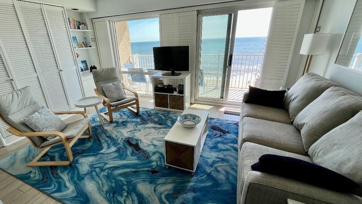South Rehoboth Condo | OCEAN FRONT CONDO. ENJOY YOUR MORNING COFFEE SITTING ON YOUR PRIVATE BALCONY WATCHING THE SUNRISE.