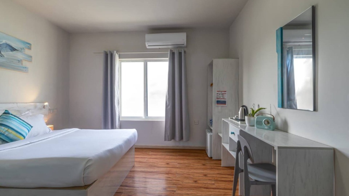 Cocoa Island Hotel | Ocean Pearl : Deluxe Triple Room