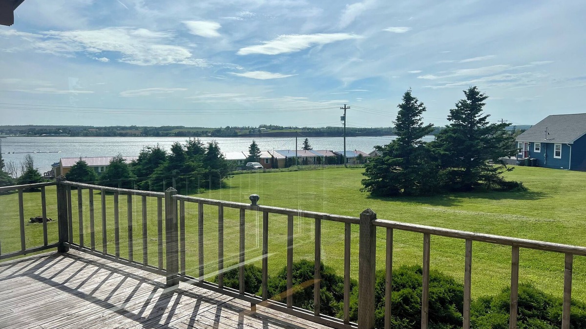 Bayview Cottage | Ocean view cottage with a perfect wrap around deck to watch beautiful sunsets.
