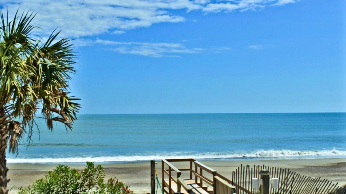 Kure Beach Condo | Oceanfront first floor condo with large deck. Indoor and Outdoor pools.