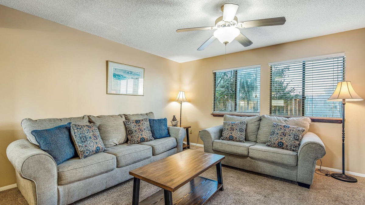 Sugar Beach House | Oceanfront townhouse near beach with pool, balcony, central AC, & washer/dryer