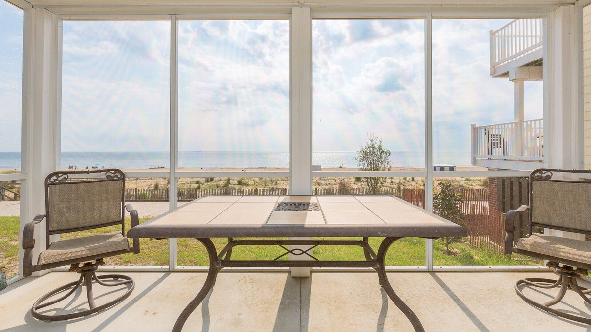 South Rehoboth House | Oceanfront Unit in heart of Rehoboth Beach with covered porch front and back