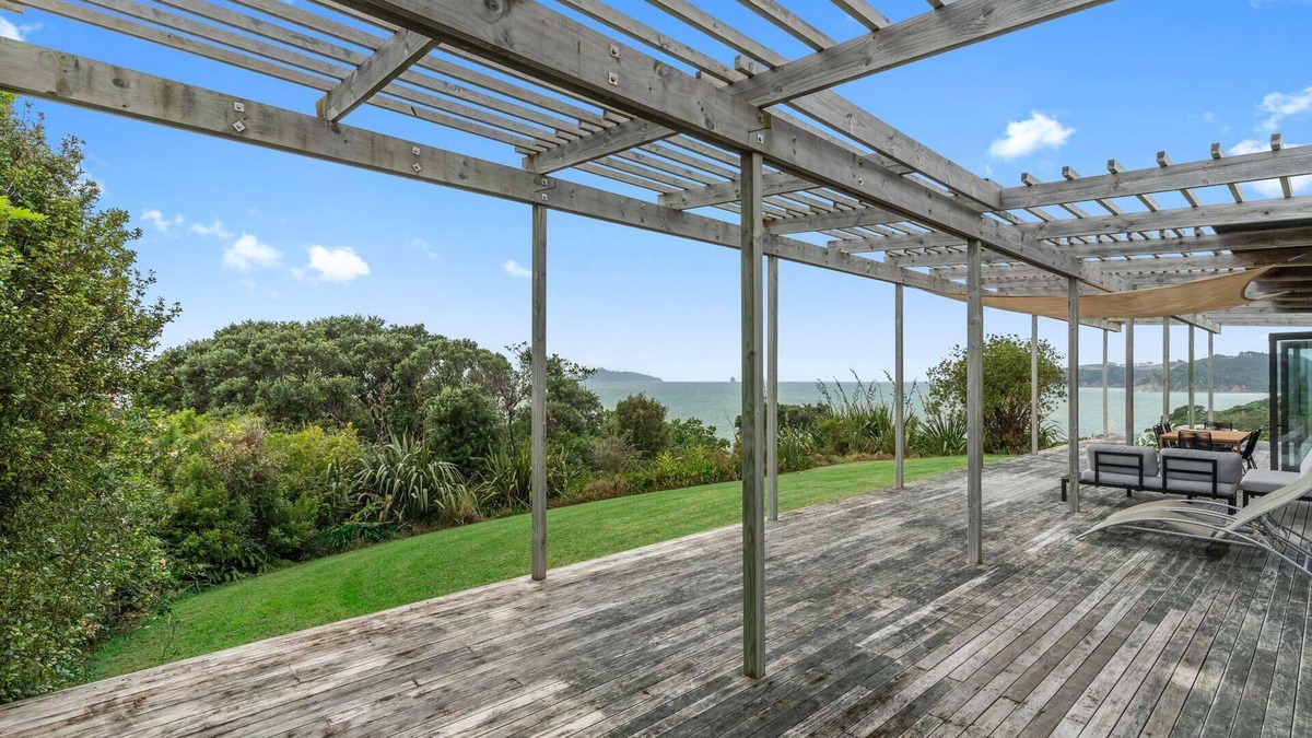 Langs Beach House | Oceanview Sanctuary - Modern, sunny holiday home with extensive decks and stunning views over Bream Bay
