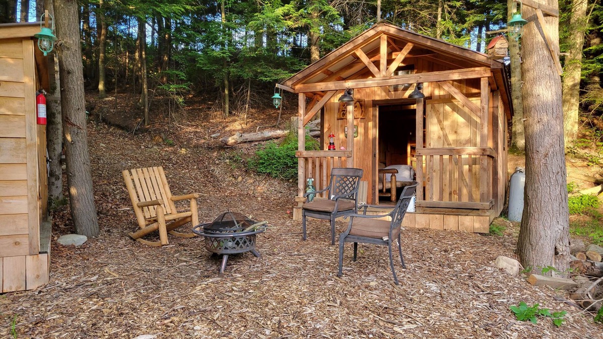 Rome Cabin | Off Grid Cabin nestled in the woods next to a stream at the base of Tug Hill