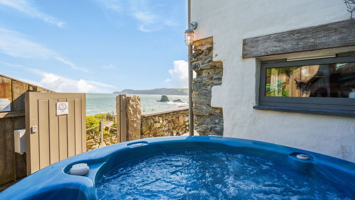 Charlestown Cottage | ON AMAZING SPACES! Luxurious Beach Front Retreat with Hot Tub & Log Burner