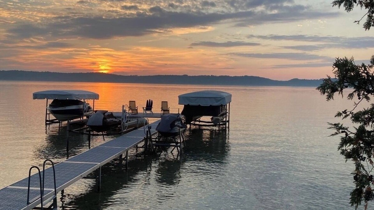 Clam River Cottage | ON TORCH LAKE! Fall Colors are beautiful reflection off of Torch Lake