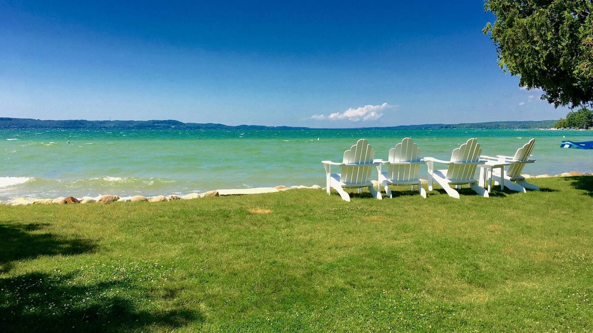 Clam River Cottage | ON TORCH LAKE SANDY BEACH COTTAGE HOME! AMAZING SUNSETS! LARGE YARD JUST OPENED