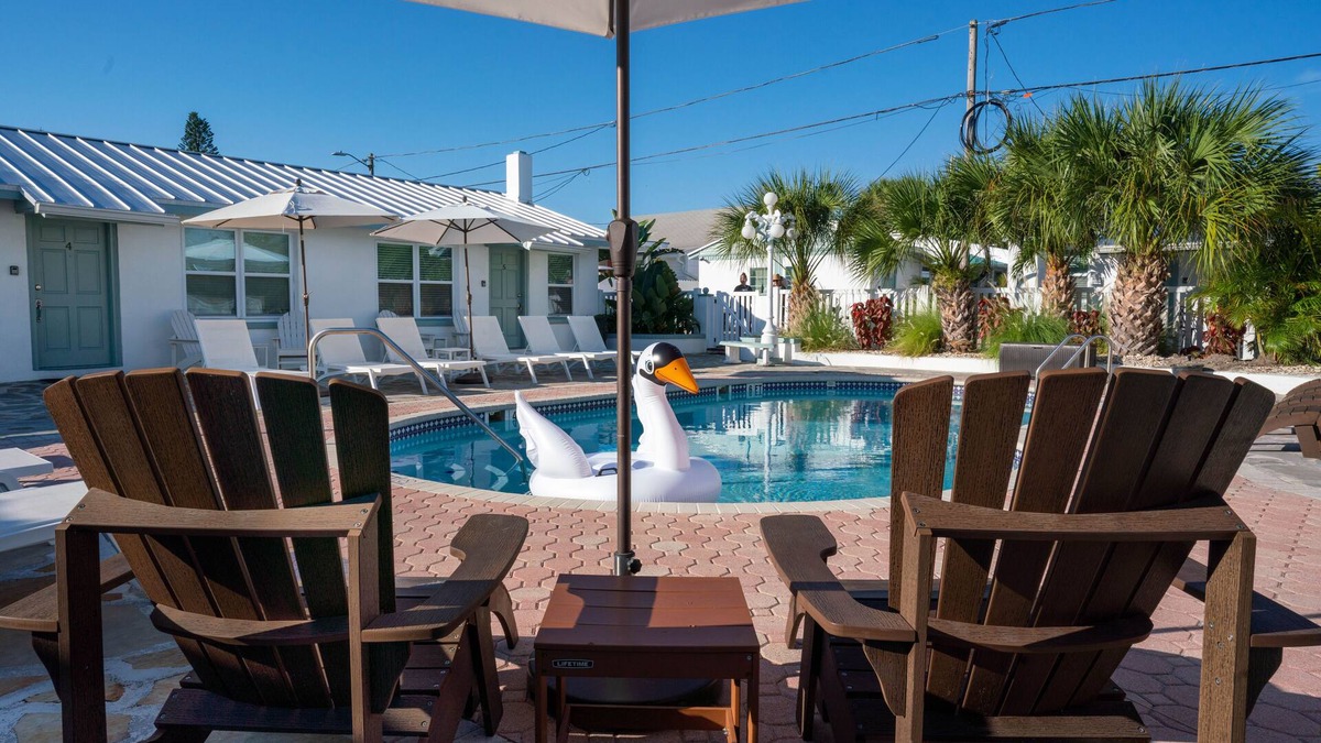 Treasure Island Resort | One bedroom poolside suite. Steps to beach and John’s Pass. HEATED POOL.