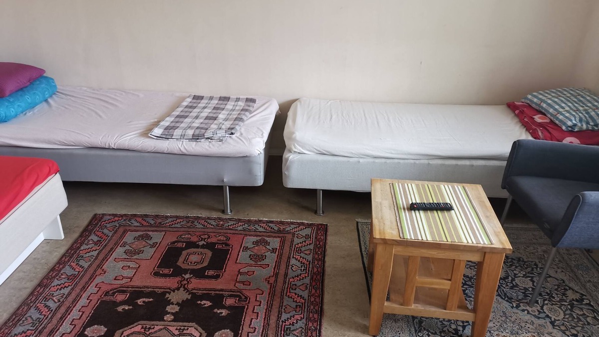 Angered Apartment | One large room with 3 single beds. Max for three people 12 min from city center