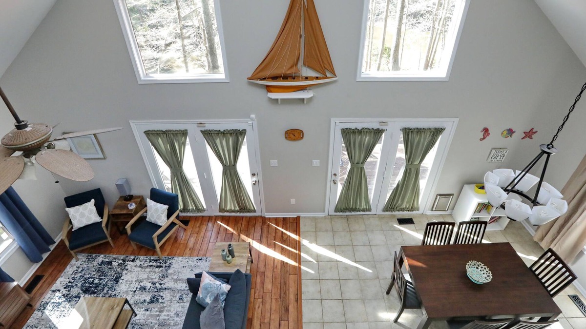 Chesapeake Ranch Estates-Drum Point House | One of a kind waterfront house with pond/creek, deck, privacy and beach access.