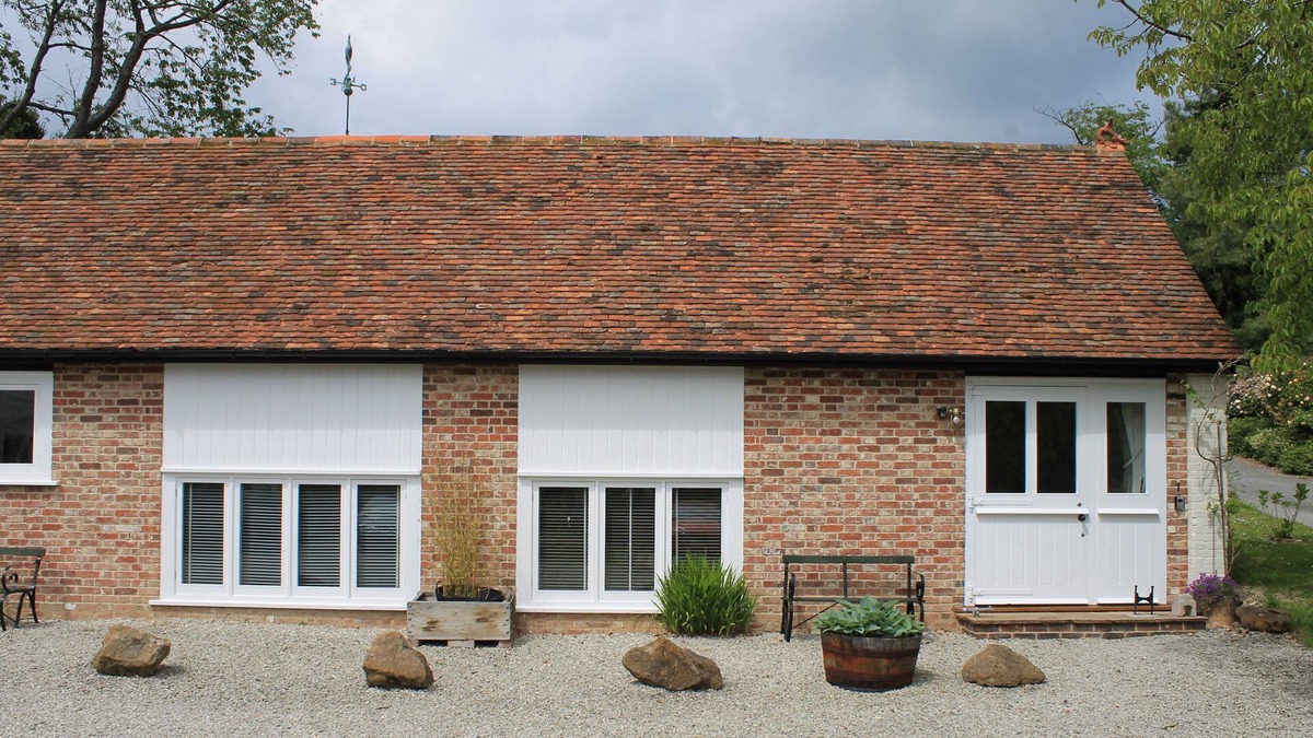 Chillenden Cottage | One of a pair of beautifully converted stables set over 2 floors with a wealth of beams, and origina