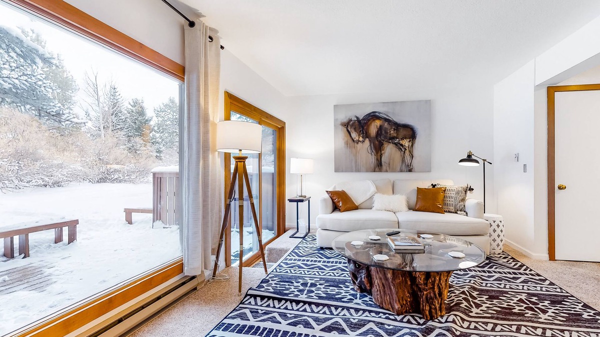 Jackson Hole Condo | Open and inviting, two-story condo with full kitchen, patio, and wildlife views