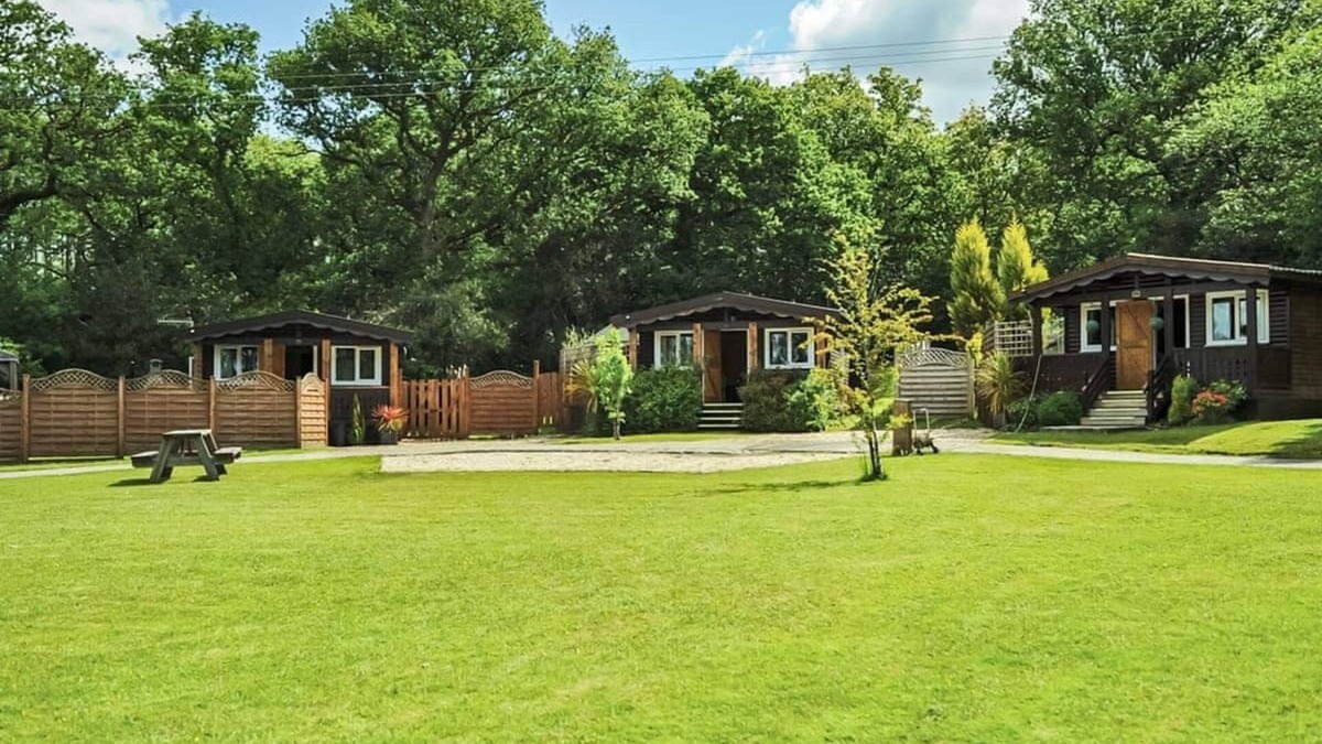 Ystradgynlais Ski Chalet | Open plan lodge with two doubles, both with TV/DVD.