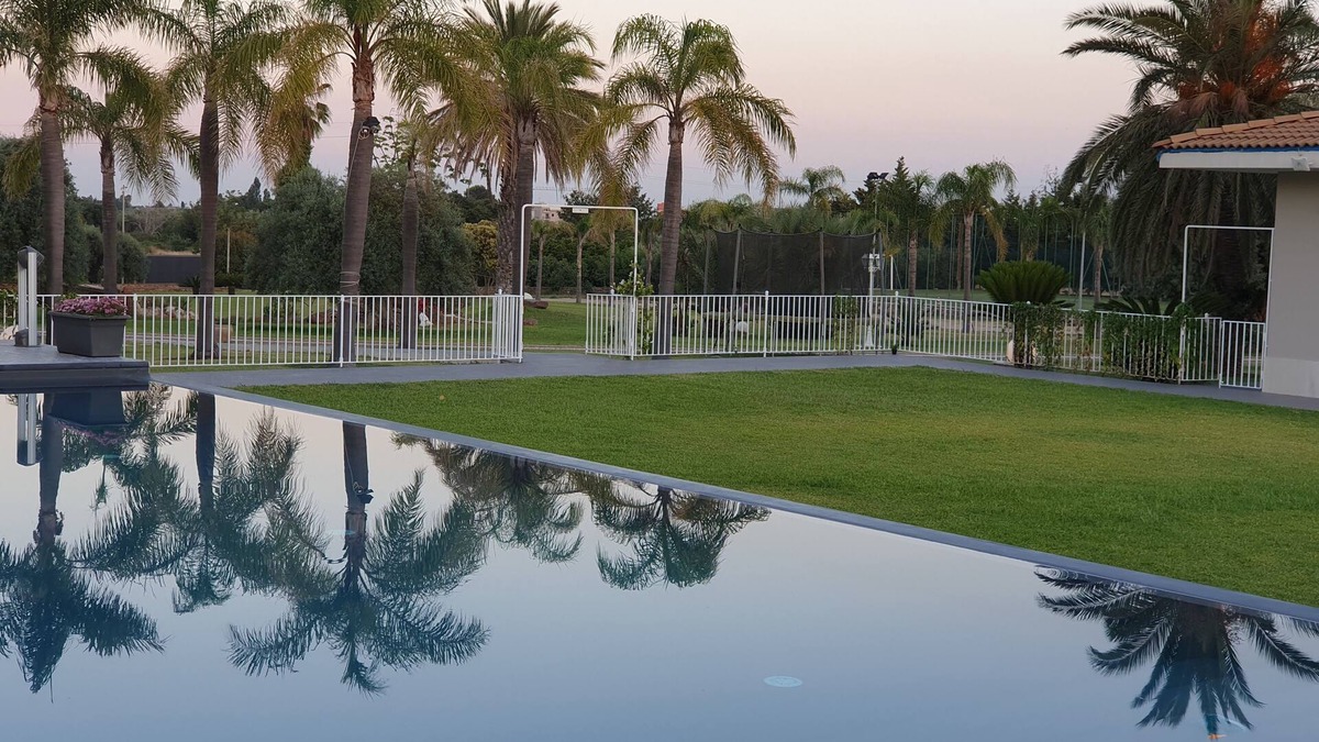 Floridia Villa | Orange house with large park and swimming pool.