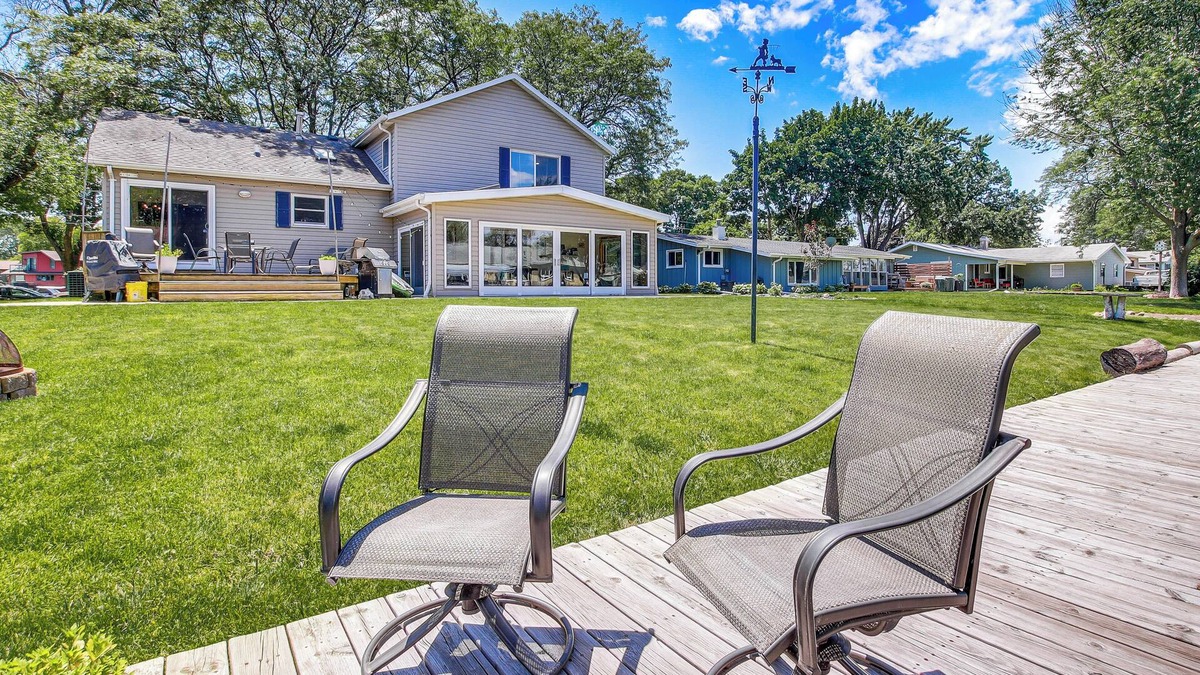 Oshkosh House | Oshkosh Canal-Front Home w/Sunroom & Watercraft!