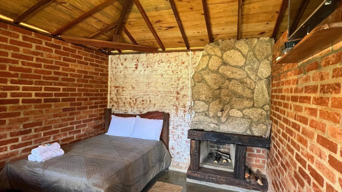 Senador Amaral House | Our cabin at the top of the property with verandah and veranda
