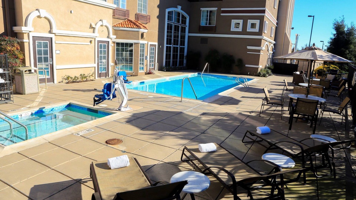 Milpitas Condo | Outdoor Pool & Hot Tub. Free Breakfast. Free Shuttle.