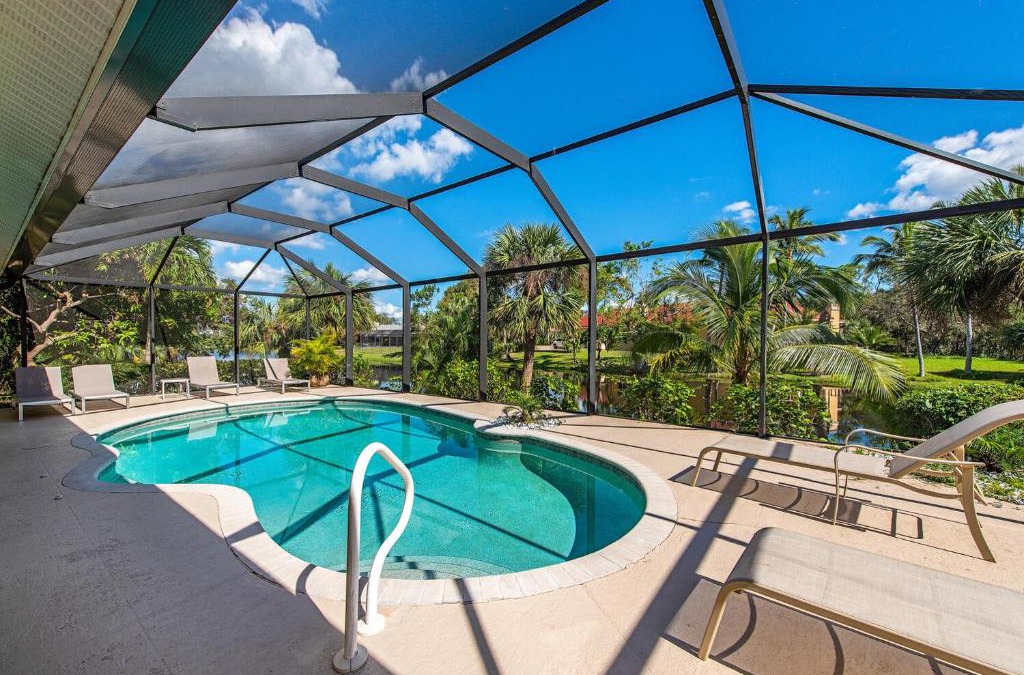 Palm River Estates Villa | Palms and Pool home in Naples best beaches and national parks