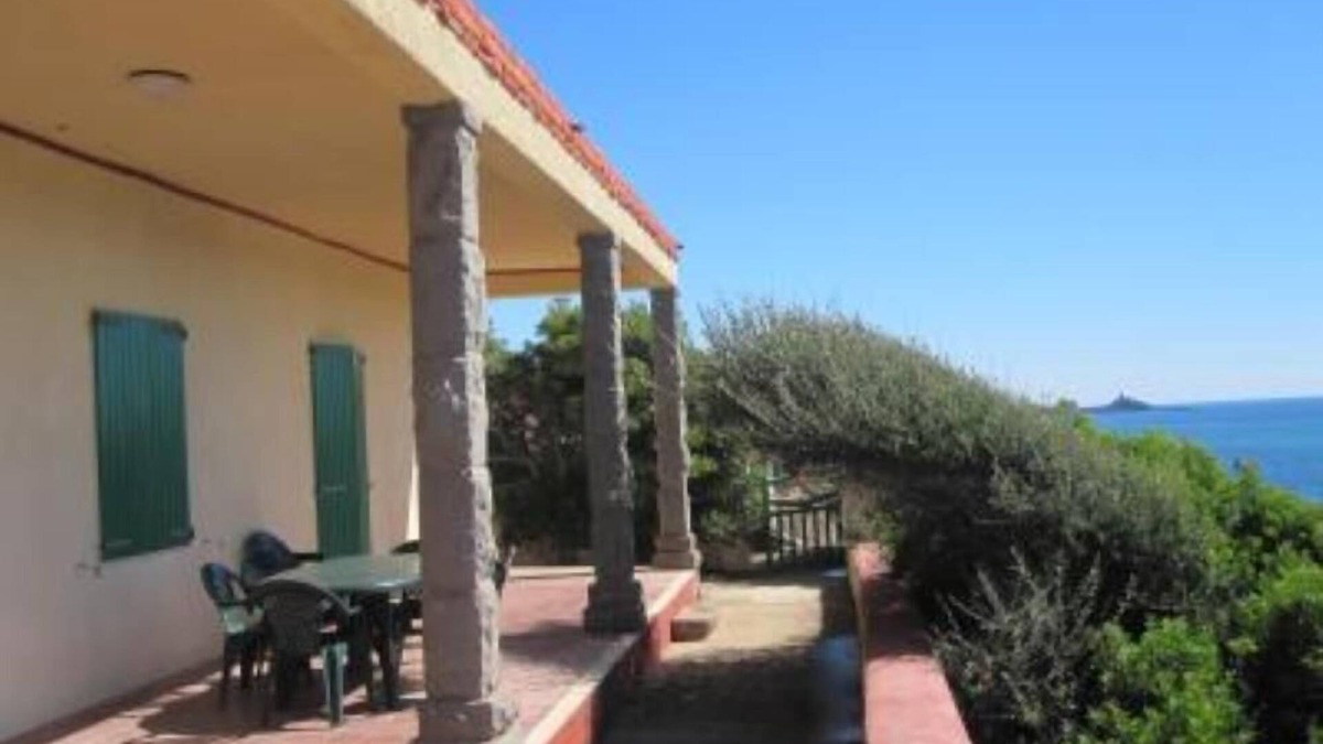 Porto Alabe Villa | Panoramic sea front housewith garden and beach directly below