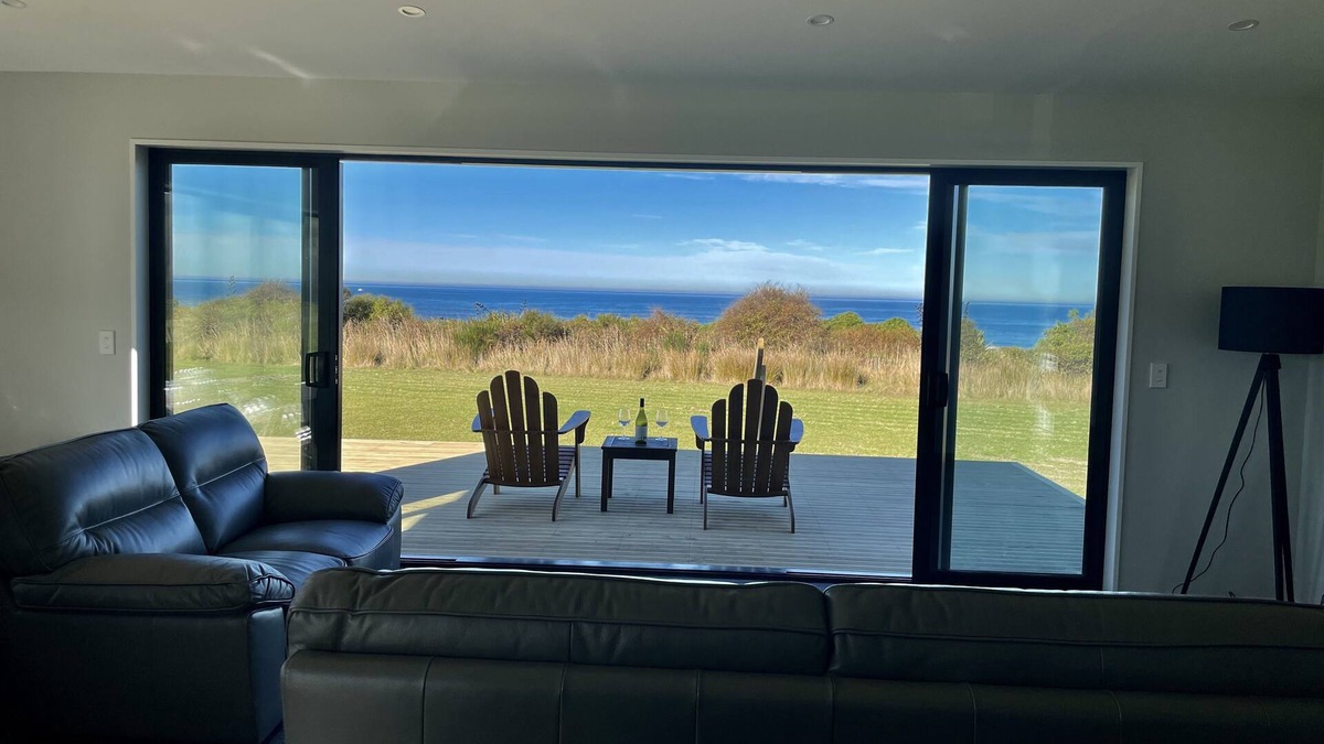 Surat Bay House | Panoramic views of the ocean close enough to the beach to hear the waves.