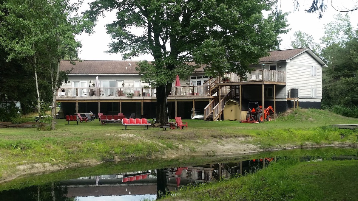 Norton Shores Apartment | Paradise Cove Harbor ~ 2 Bedroom/1 Bath Apartment WIFI, Fishing, and Firepit
