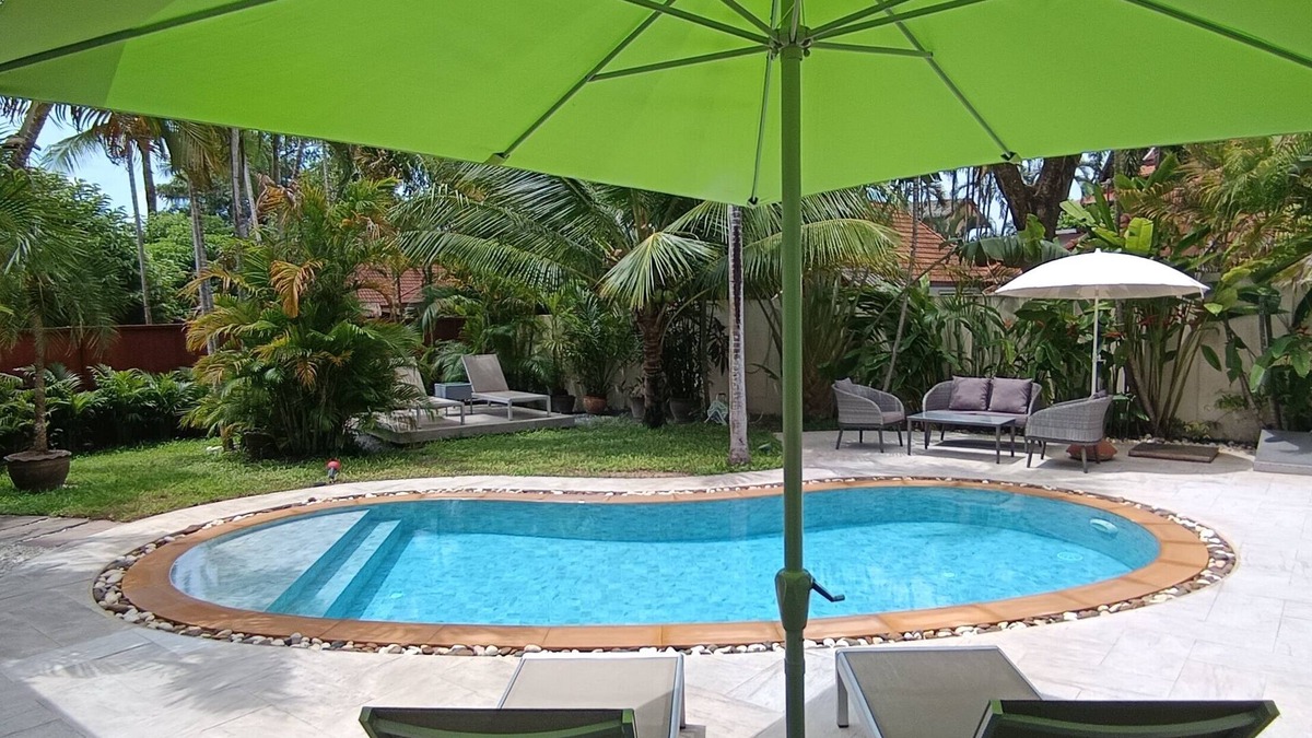 Rawai Villa | Paradise Island Villa 3 features a private swimming pool in a luxurious tropical park.