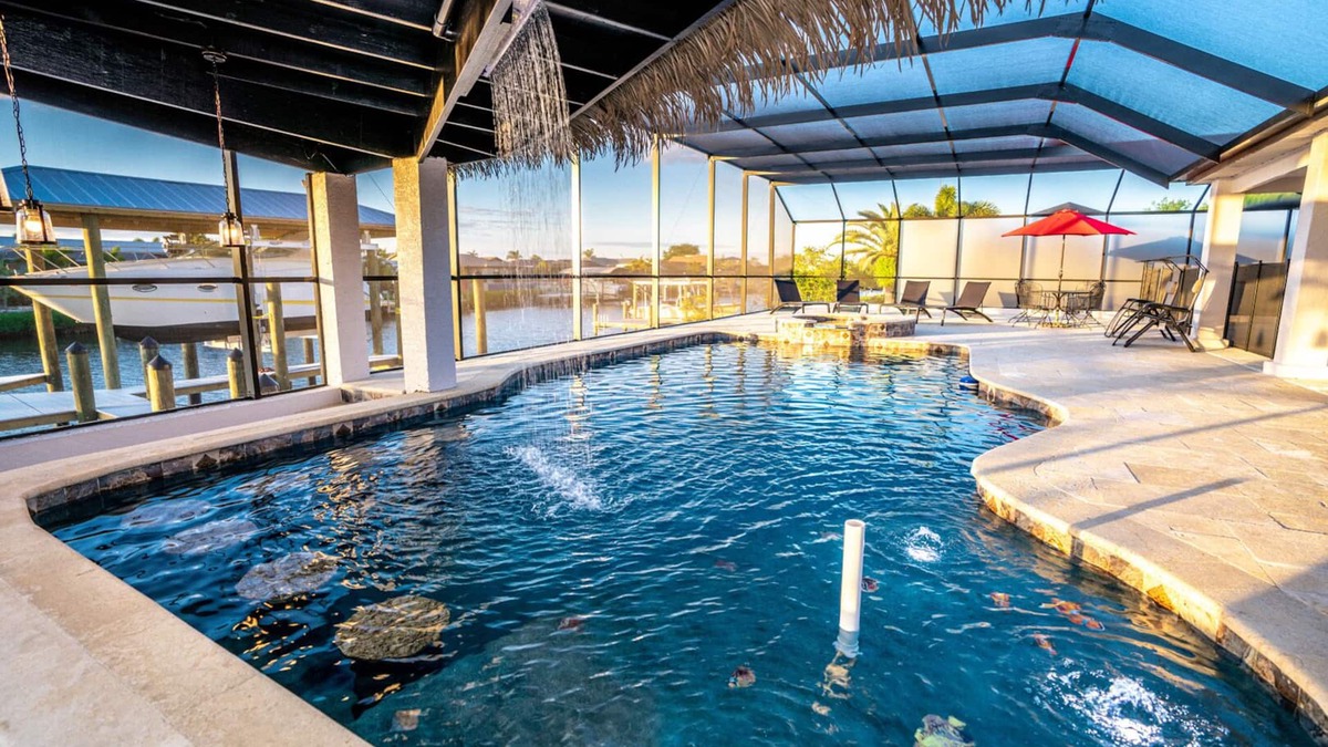 Apollo Beach House | Paradise Waterfront Resort! Pool &Spa with swim-up bar, Dock Kayaks, Pet Welcome