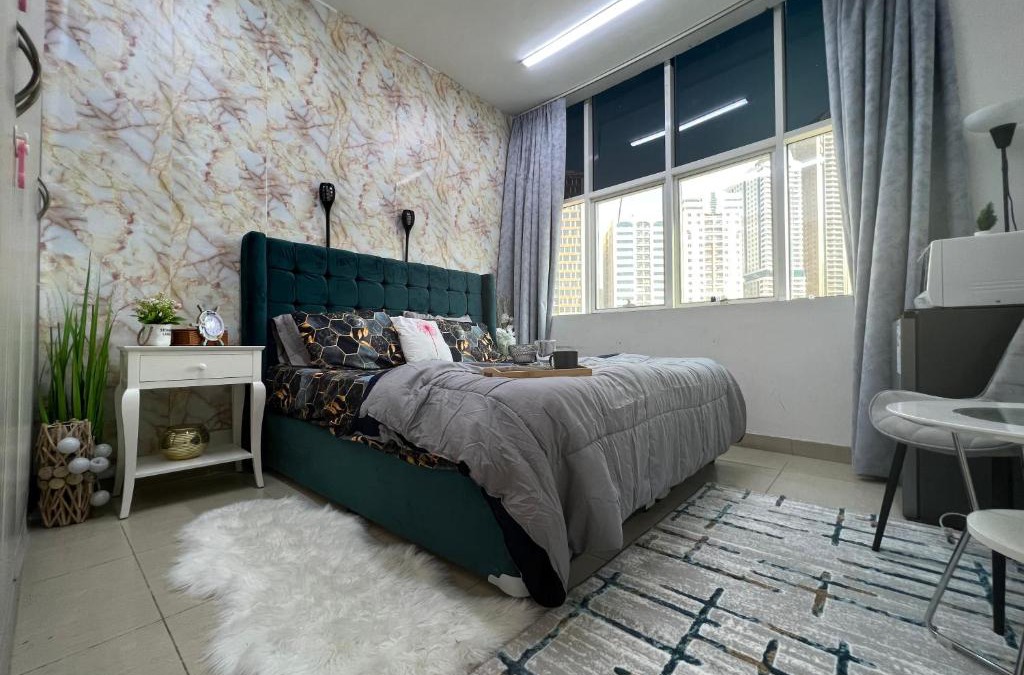 Al Majaz House | Park view bedroom in family apartment