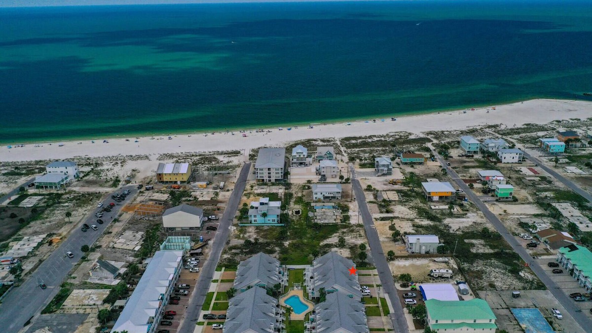 Mexico Beach House | PEACEFUL EASY FEEELING OFFERS GULF VIEWS & STEPS FROM BEACH! COMMUNITY POOL!